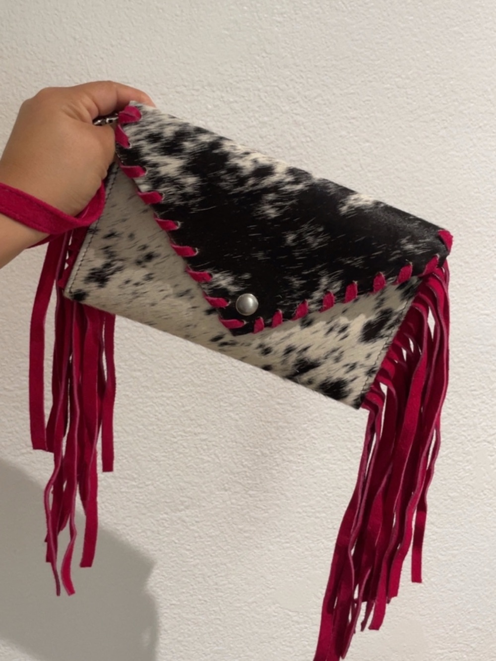 Black & White Cowhide Wristlet Clutch with Pink Fringe